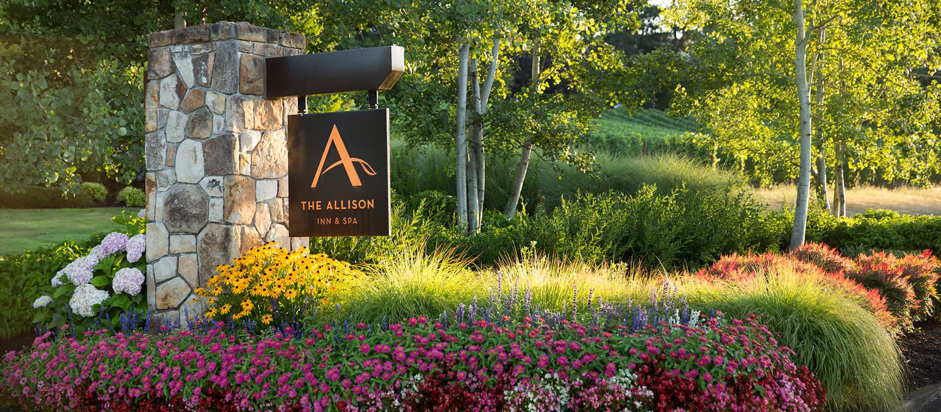 Allison Front Entrance Sign With Flowers In Bloom