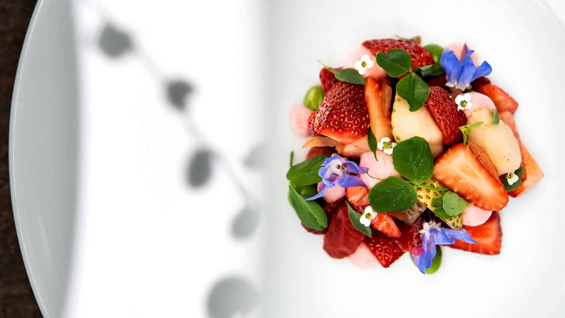 Fresh Colorful Strawberry Salad With Edible Flowers