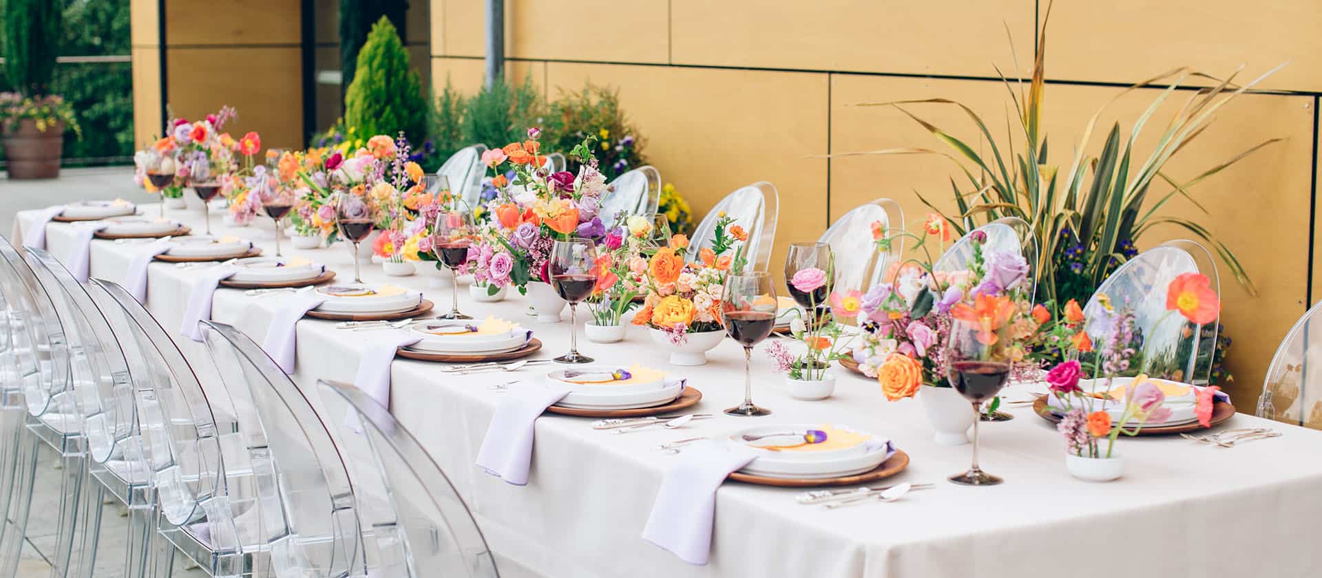 Allison Weddings Table Setup With Colorful Flowers And Local Wine
