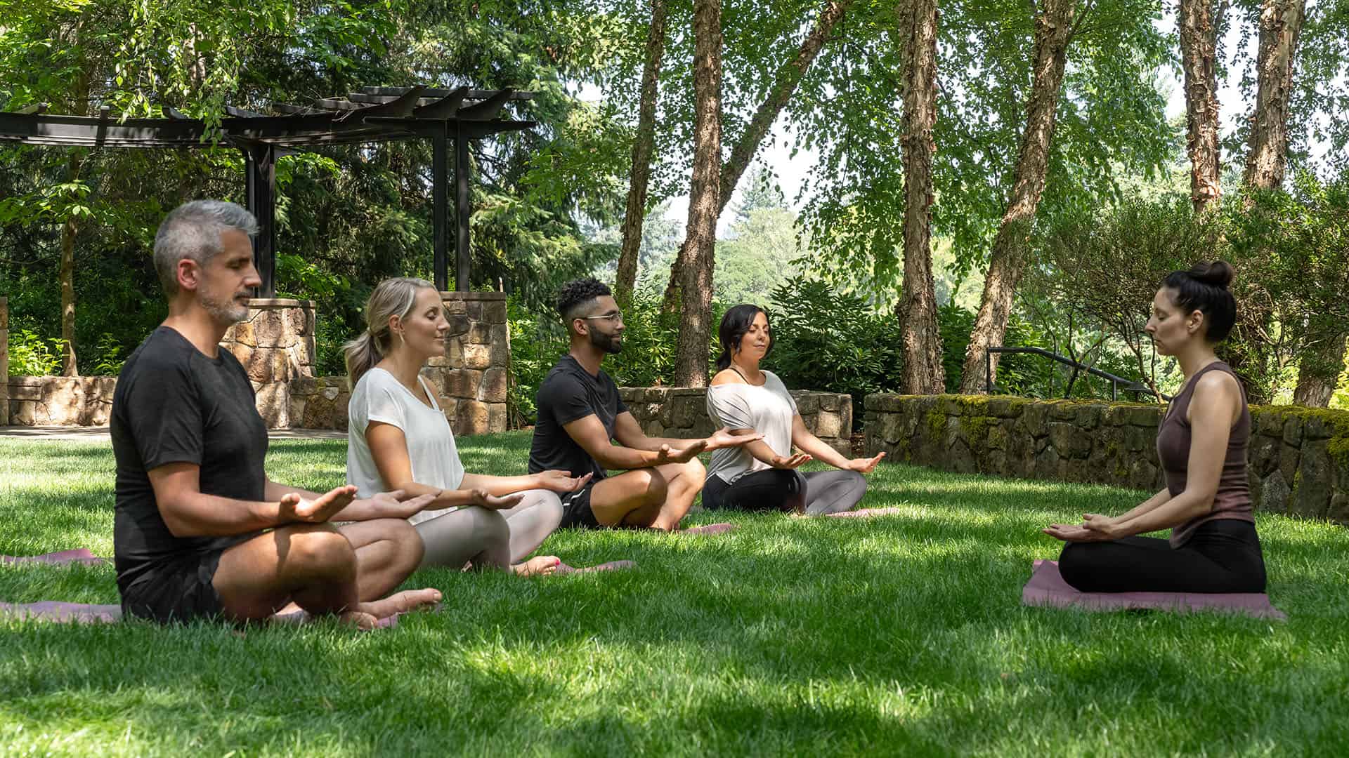 Outdoor Summer Yoga In The Meadow Garden At The Allison Inn and Spa