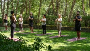 Outdoor Summer Yoga In The Meadow Garden At The Allison Inn and Spa