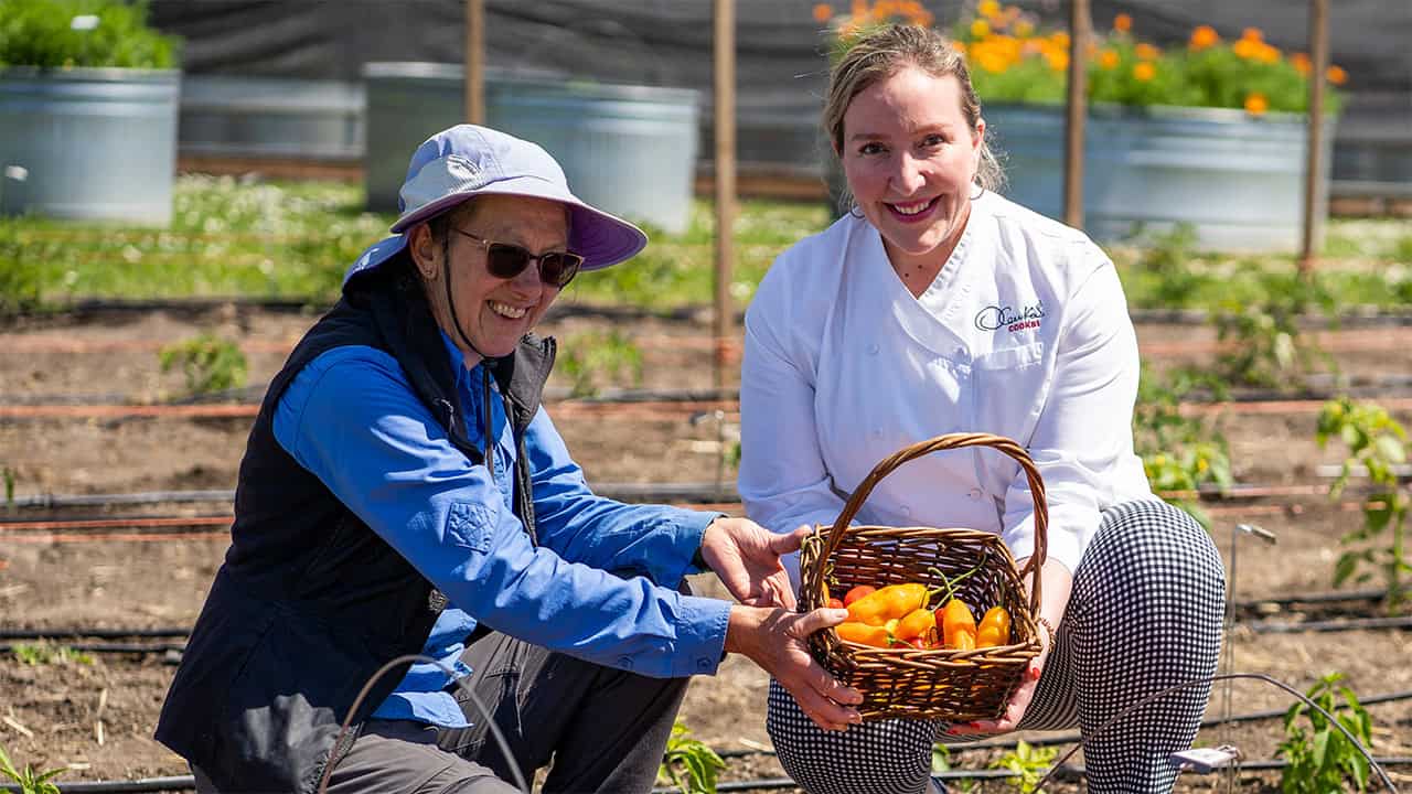 Chef Olenka and Allison Master Gardener Anna With Peruvian Peppers Grown in Chef's Garden