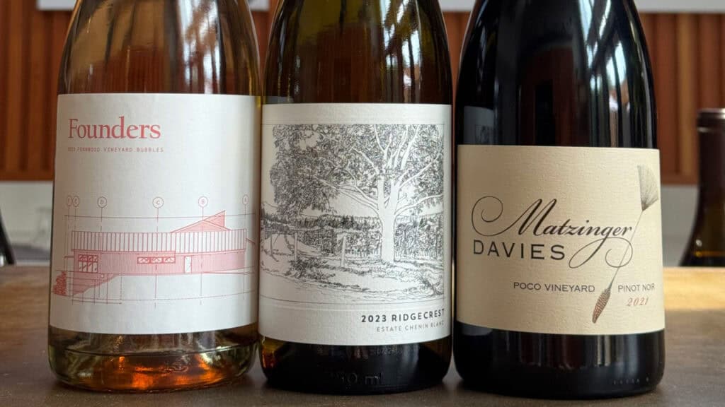 Bottles of Founders wine, Ridgecrest wine and Matzinger Davies and wine on a table.