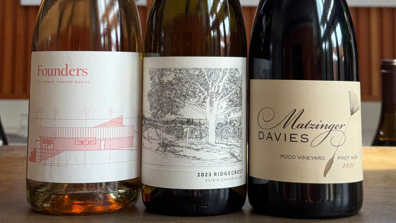 Bottles of Founders wine, Ridgecrest wine and Matzinger Davies and wine on a table.
