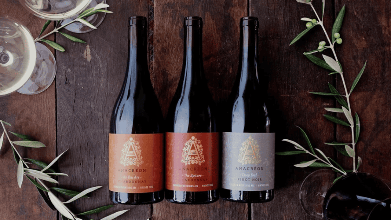 Three bottles of Anacréon wine.