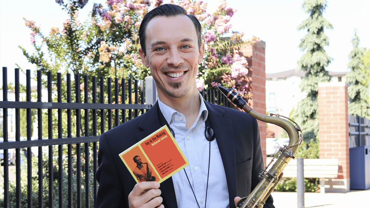 Nathanael Ankeny pictured with his album, Joy in the Making.