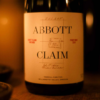 A close up of a bottle of wine from Abbott Claim.