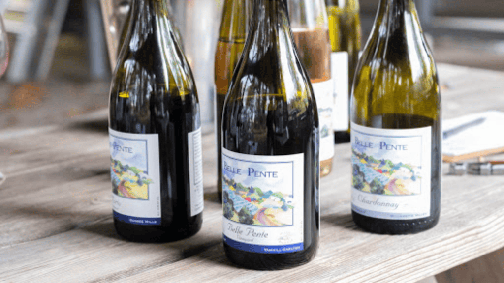Belle Pente wine bottles on a table.