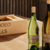 Two bottles of wine from Rodeo Hills on a table.