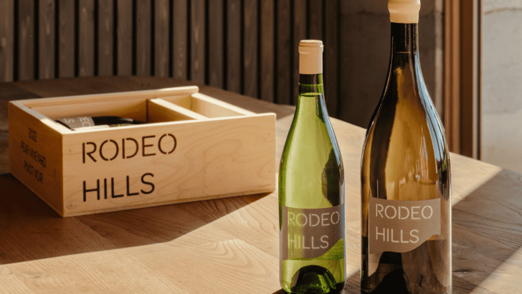Two bottles of wine from Rodeo Hills on a table.