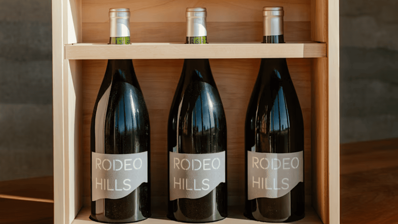 Three bottles of wine from Rodeo Hills packaged in a wooden box.
