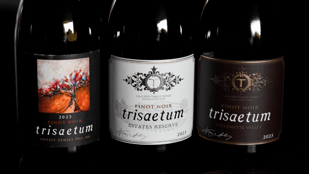 Three bottles of Trisaetum wine.