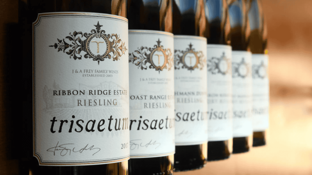 Bottles of Trisaetum wine lined up.