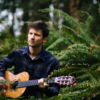 A photo of Brian Rahija, a musician performing at The Allison.