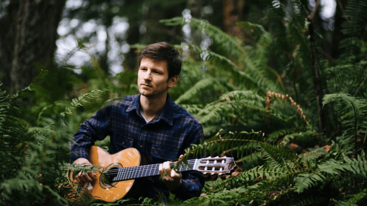 A photo of Brian Rahija, a musician performing at The Allison.