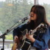 Mayra Sandoval, a musician from McMinnville, playing the guitar.