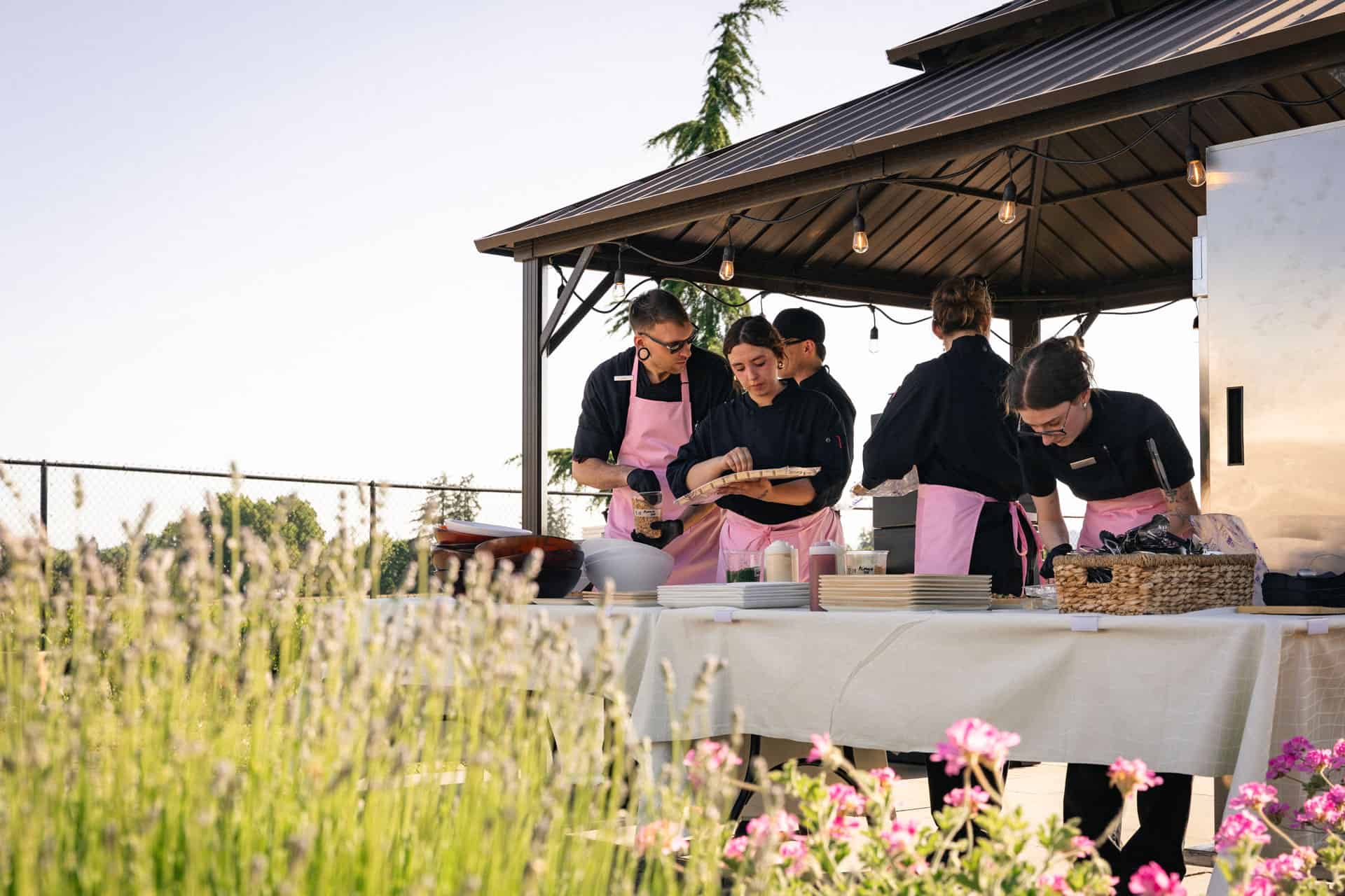 Banquets team preparing appetizers for an event in the Chef's Garden.